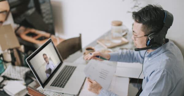 working remote at desk on laptop