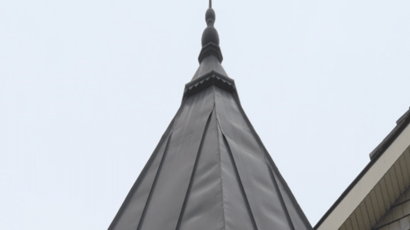 Oil Canning of Copper Panel Roofing at Residence