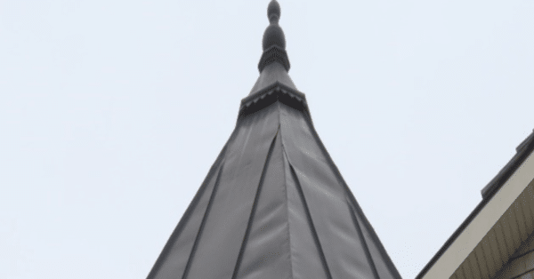 Oil Canning of Copper Panel Roofing at Residence
